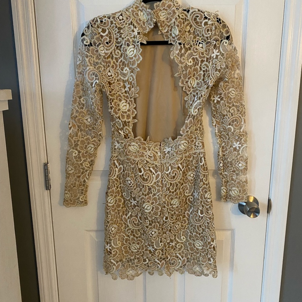 Venus dress.  Great for holidays Gold/beige w white and gold appliqués.